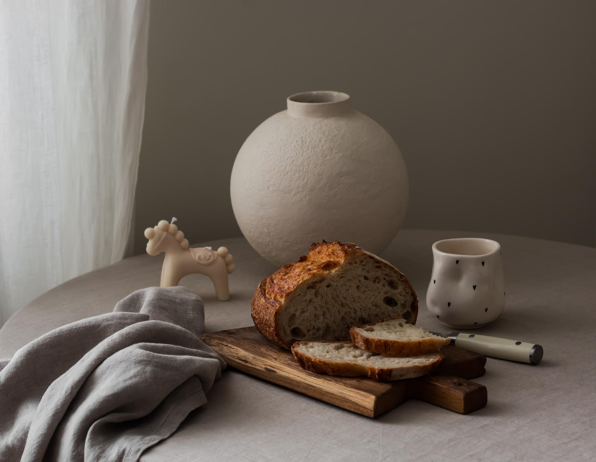 Monochrome still life with bread and ceramic