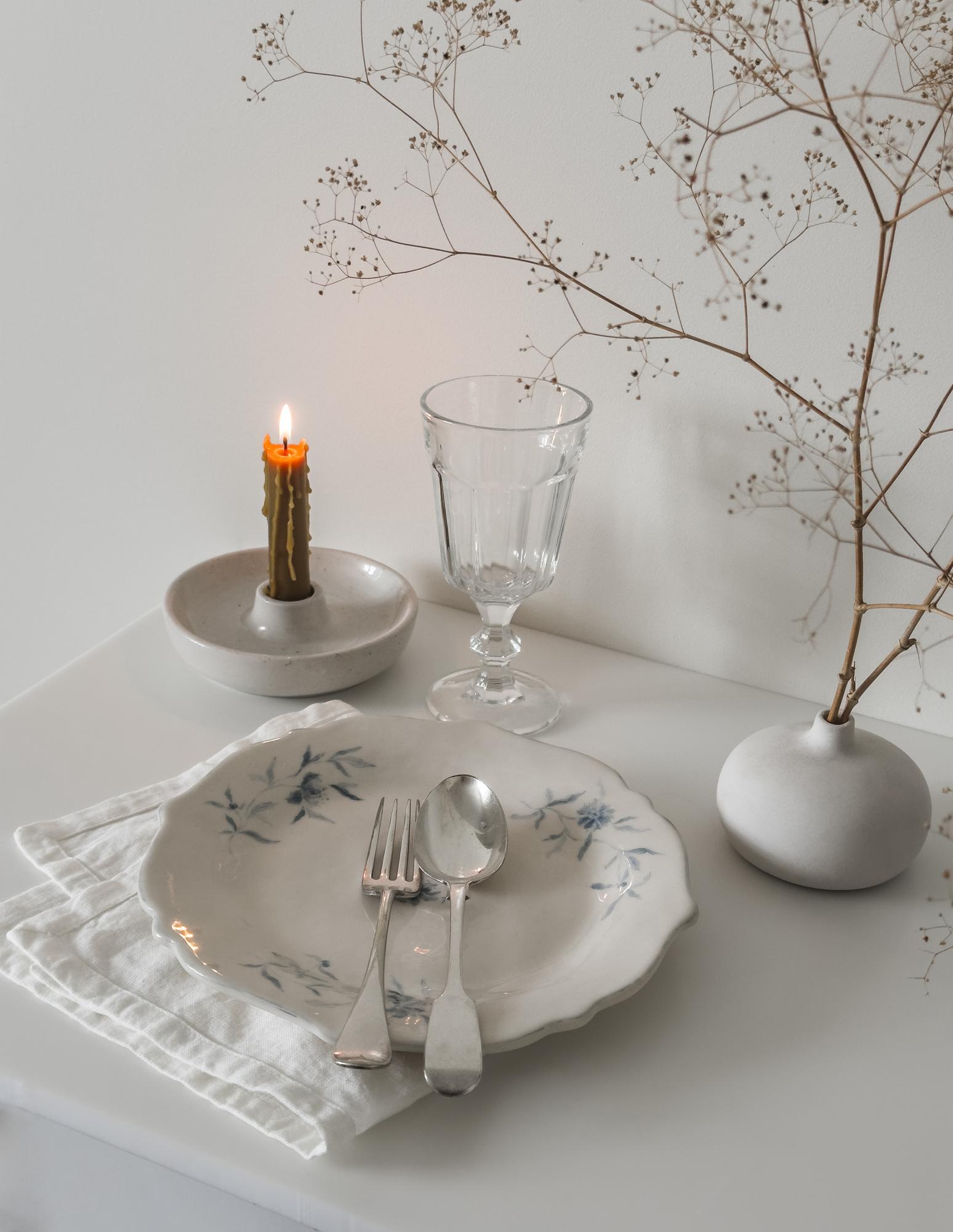 Minimal dining table setting with soft light